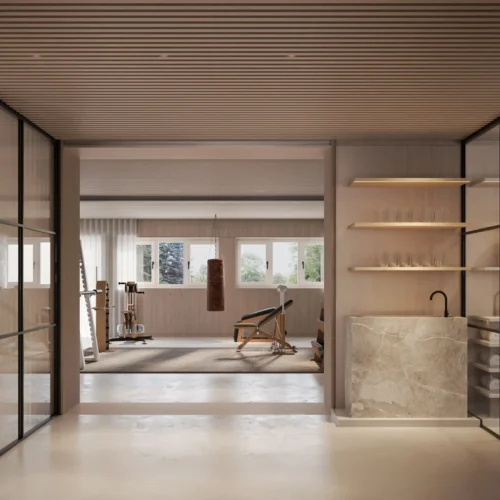 2511 CON_Fitnessbereich Moderner Fitnessbereich mit Boxsack, Trainingsbank und Geräten in einem Boutique Resort im Schwarzwald mit Wellness-Ambiente